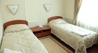 Гостиница Европа Ноябрьск Стандартный двухместный номер с 1 кроватью или 2 отдельными кроватями (1 взрослый)-2